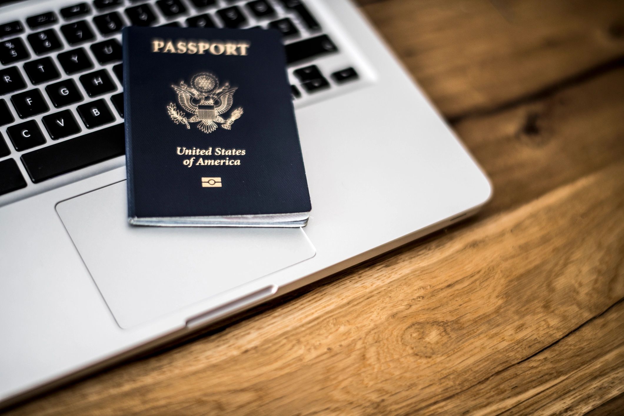 Passport and travel documents on a desk